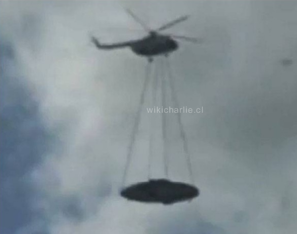 Helicoptero llevando un ovni.png